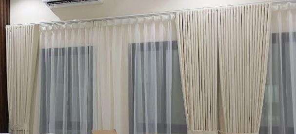 a white curtain with a white curtain